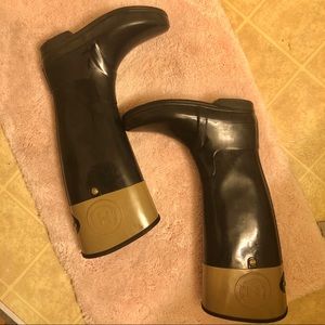 Tan and black Hunter rain boots